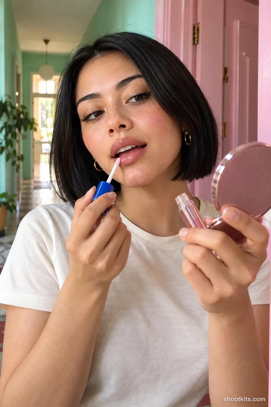 Gloss on the go: makeup photo made with ChatGPT. mint hallway beside a pink doorway with a small pocket mirror.