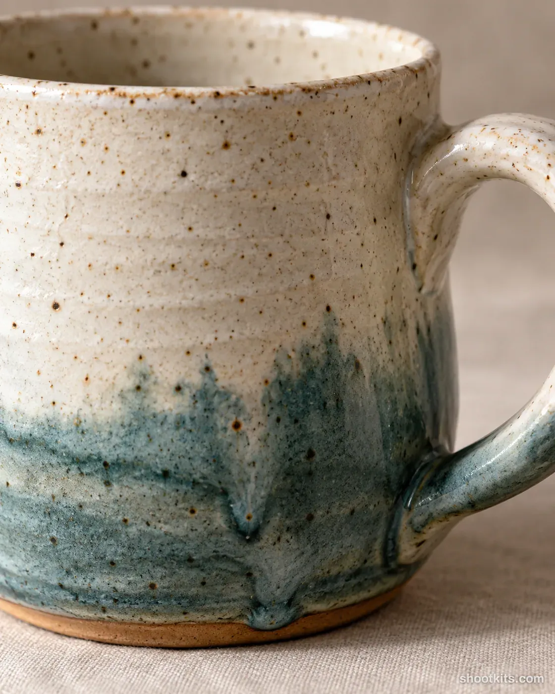 Glaze detail: handmade piece photo made with ChatGPT. Neutral surface.